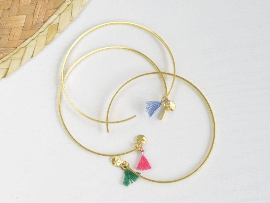 Renna Deluxe Armreif in Gold, Goldarmreif mit niedlicher Tassel im Boho-Stil Bestseller