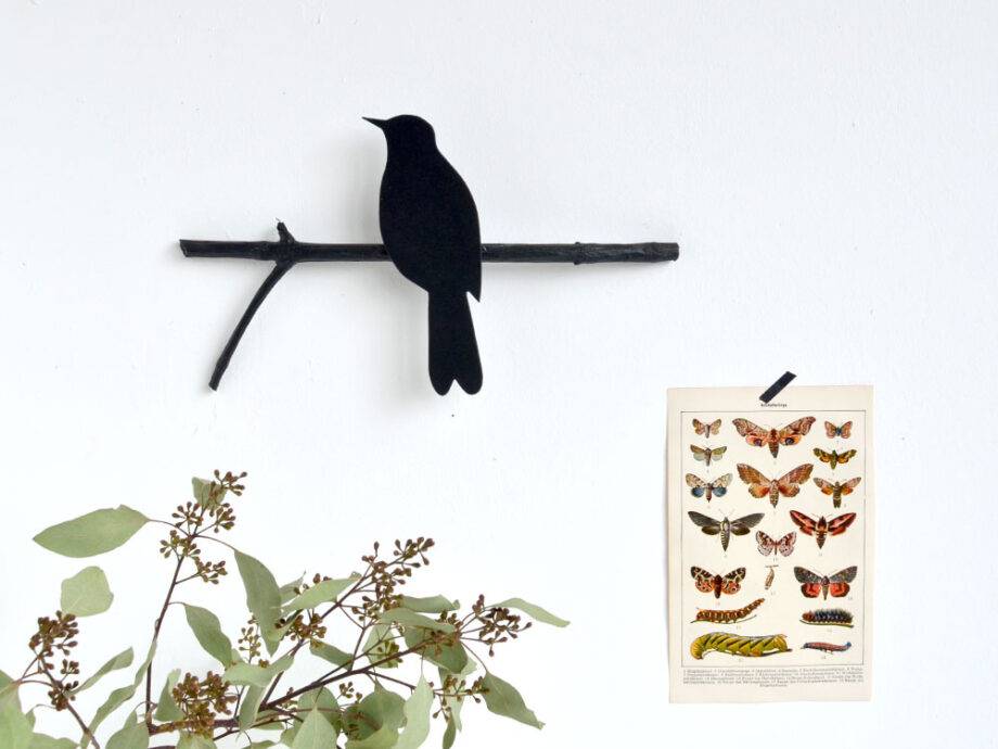 Renna Deluxe Amsel in Fraktur auf dem Ast Begrenzt auf 3 Tage