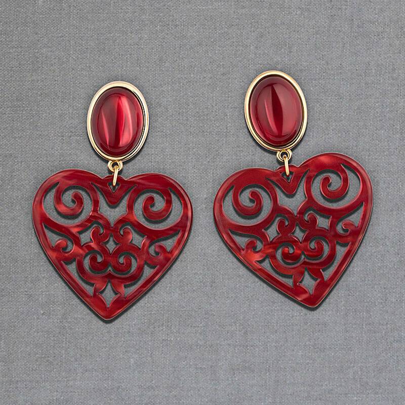 SchwesterSchwester Schöne Ohrringe in schimmerndem Rot mit Herz-Ornamenten von AmuseToi Online